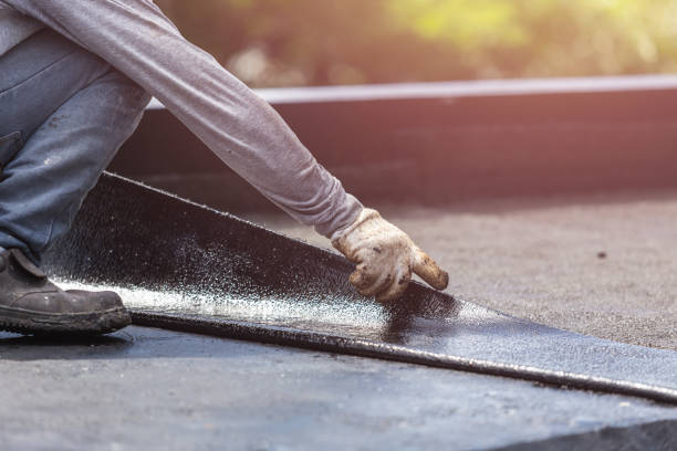 Professional Basement Waterproofing technician working in Lignum, VA